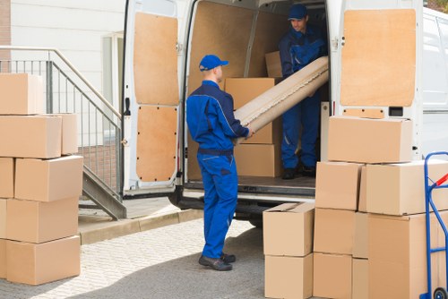 Removal van loading for a Battersea home move near local flats