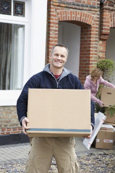 Removal team planning a Battersea move outside a residential property