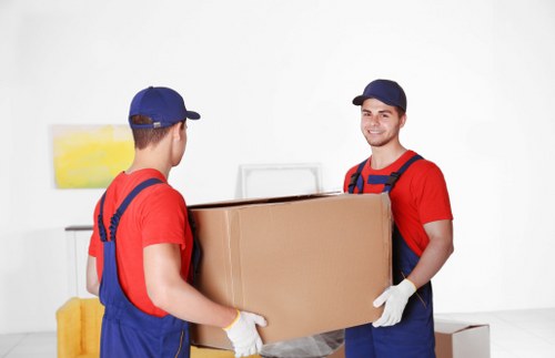 Moving team reviewing a customer complaint form in an office setting