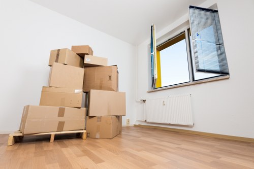 Office furniture and equipment being moved with a van service in Battersea