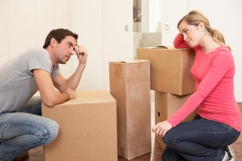 Loading household items into a removals van for a Battersea property move